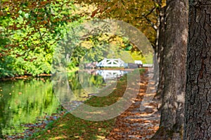 Water channel at gardens of Schwetzingen palace in Germany during sunny summer day