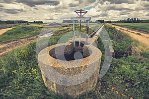 Water channel in a irrigated crop plantation in the province of Zamora Spain