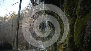 Water coming out of the stone wall `rinnende wand` near molln, upper austria