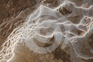 Water coming from Strokkur forming abstract patterns. Geysir known as The Great Geysir, is a geyser in southwestern Iceland.