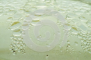 Water condensate on glass teapot lid closeup