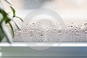 Water condensation on window glass. Humidity in the house. Home moisture