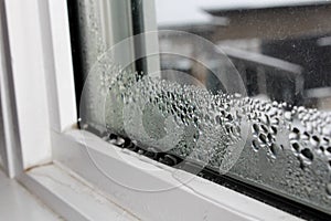 Water condensation on windows during winter photo