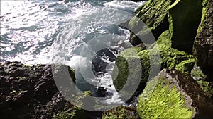 Water constantly moving in and out of the shores of the California Coast.