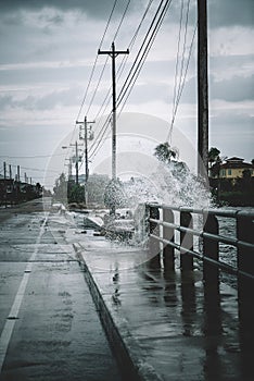 Water crashing over the street
