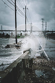 Water crashing over the street