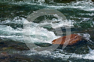 water current flow of a river in Italy