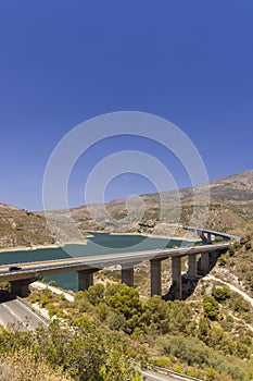 water dam Rules (Embalse de Rules), Sierra Nevada, Andalusia, Spain photo