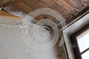 Water damaged ceiling and wall