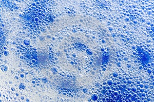 Water detergent bubbles foam blue macro