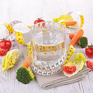 Water and dietetic vegetable photo