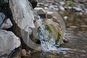 water drains from the stones in the