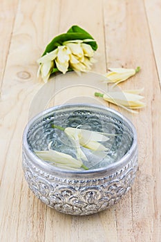 Water drink with Champaka flower.