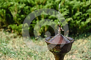 Water drinking fountain in a hot summer day