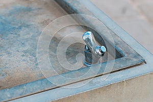 Water drinking fountain in public area. Close-up view of dry closed drinking fountain.