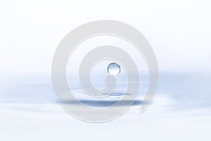 Water drop on water background photo