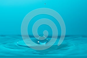 Water drop falling down.