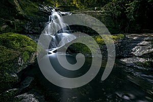 Water drop in Salto Encantado National Park, calledhumming bird jump between the jungle forest in Misiones, Argentina photo