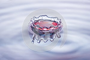 Water drop splash crown in blue and red tones