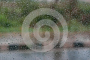 Water drop on windshield of car in rainy season.