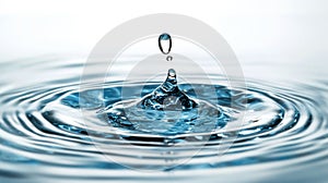 Water droplet creates ripples in a serene pool, capturing the essence of tranquility and motion
