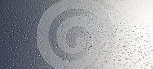 Water droplet on silver car