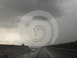 Water droplets on the car window affect visibility