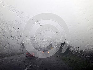 Water droplets on the car window affect visibility