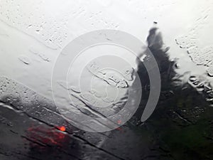 Water droplets on the car window affect visibility