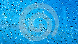 Water droplets on glass of car