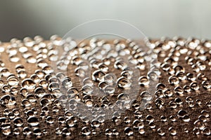 Water droplets on moisture resistant fabric Close up