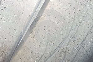Water droplets on transparent material.
