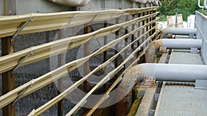 Water dropping inside cooling tower. Water droplets inside cooling tower in chemical factory or refinery plant