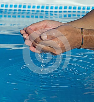 Water dropping from man hands