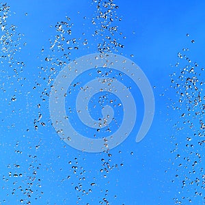 Water Drops on Blue Background