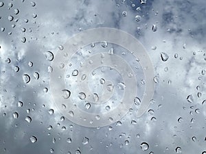 Water drops on a car glass sunroof