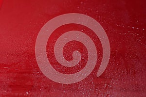 Water drops close up. Abstract red background of waterdrops, droplets