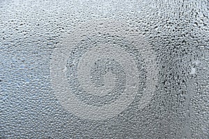 Water drops condense on glass, abstract water drops texture background