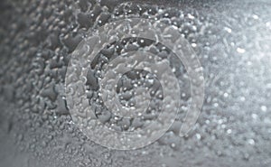 Water Drops Condensed on Frosted Plastic