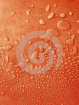 water drops of different sizes on a orange surface, drops texture, rain on orange tile, rain texture, red refreshing background,