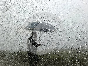 Water drops on the glass,Concept of driving in rain, bad driving conditions, selective focus