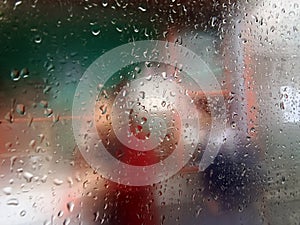 Water drops on the glass,Concept of driving in rain, bad driving conditions, selective focus