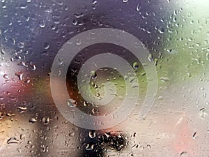 Water drops on the glass,Concept of driving in rain, bad driving conditions, selective focus