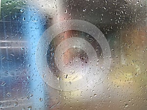 Water drops on the glass,Concept of driving in rain, bad driving conditions, selective focus