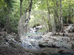 water drops on glass surface as background