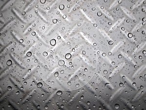 water drops on glass surface as background