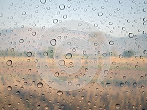water drops on glass surface as background