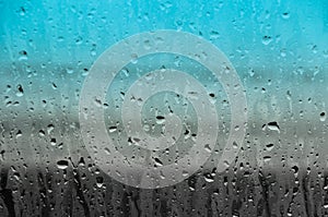 Water drops on glass texture abstract background