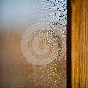 water drops on the glass wet window glass with splashes and drops of water