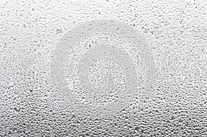 Water drops on glass window. Condensation on the window.